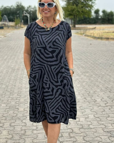 NELIA – SUNLIT EASE WITH A PLAYFUL PRINT