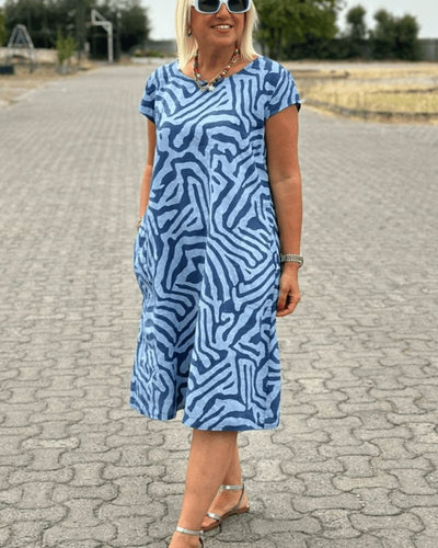 NELIA – SUNLIT EASE WITH A PLAYFUL PRINT