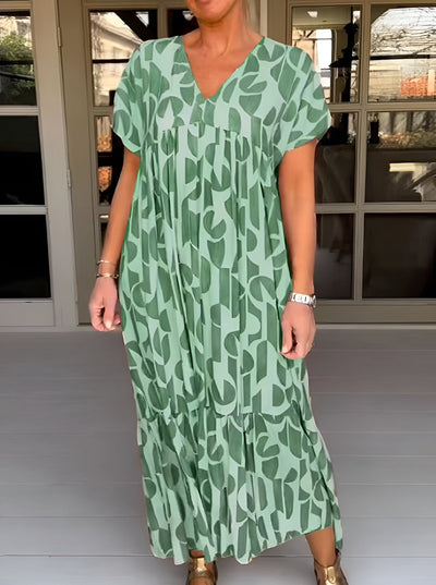 COLETTE – FLOWING CHARM V-NECK DRESS
