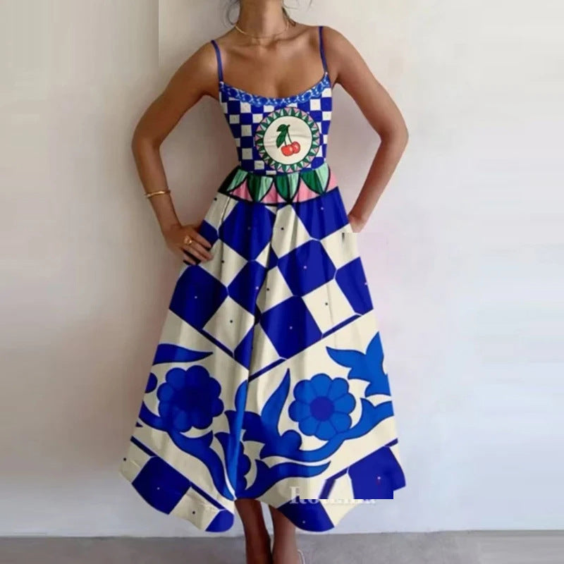 SABELLE – STRAPPY DRESS WITH BLUE DIAMOND PRINT AND REFINED EASE