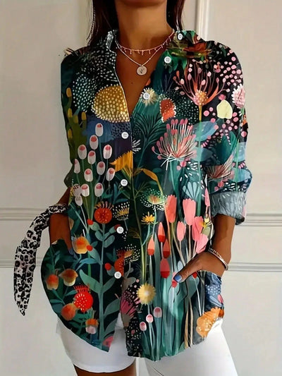 ANNIKA – COLORFUL BLOUSE WITH A PLAYFUL PRINT CHARM