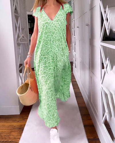 VÉRONIQUE – FLOWING V-NECK MAXI WITH SUMMER PRINT CHARM